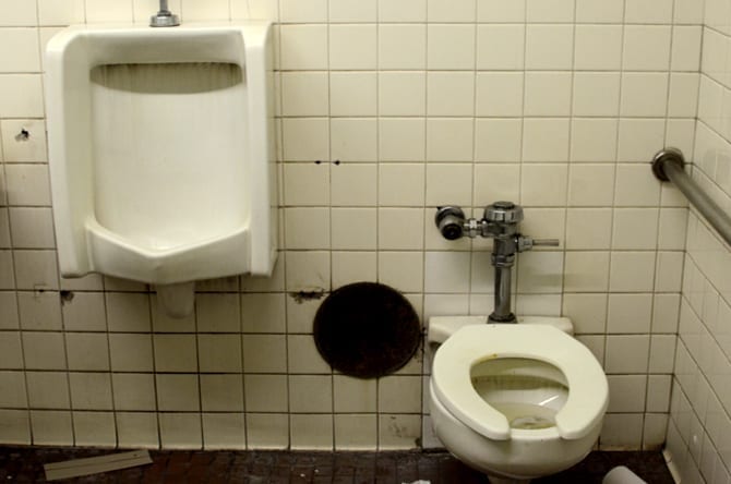dirty commercial bathroom